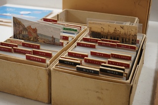 Four boxes of Edwardian and later postcards, some divided into categories including horses, lighthouses, railways, royalty, dogs, aviation, greetings, etc. Condition - fair to good.